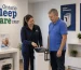 Ontario Sleep Care specialist showing a patient how to use a CPAP machine in an Ontario clinic
